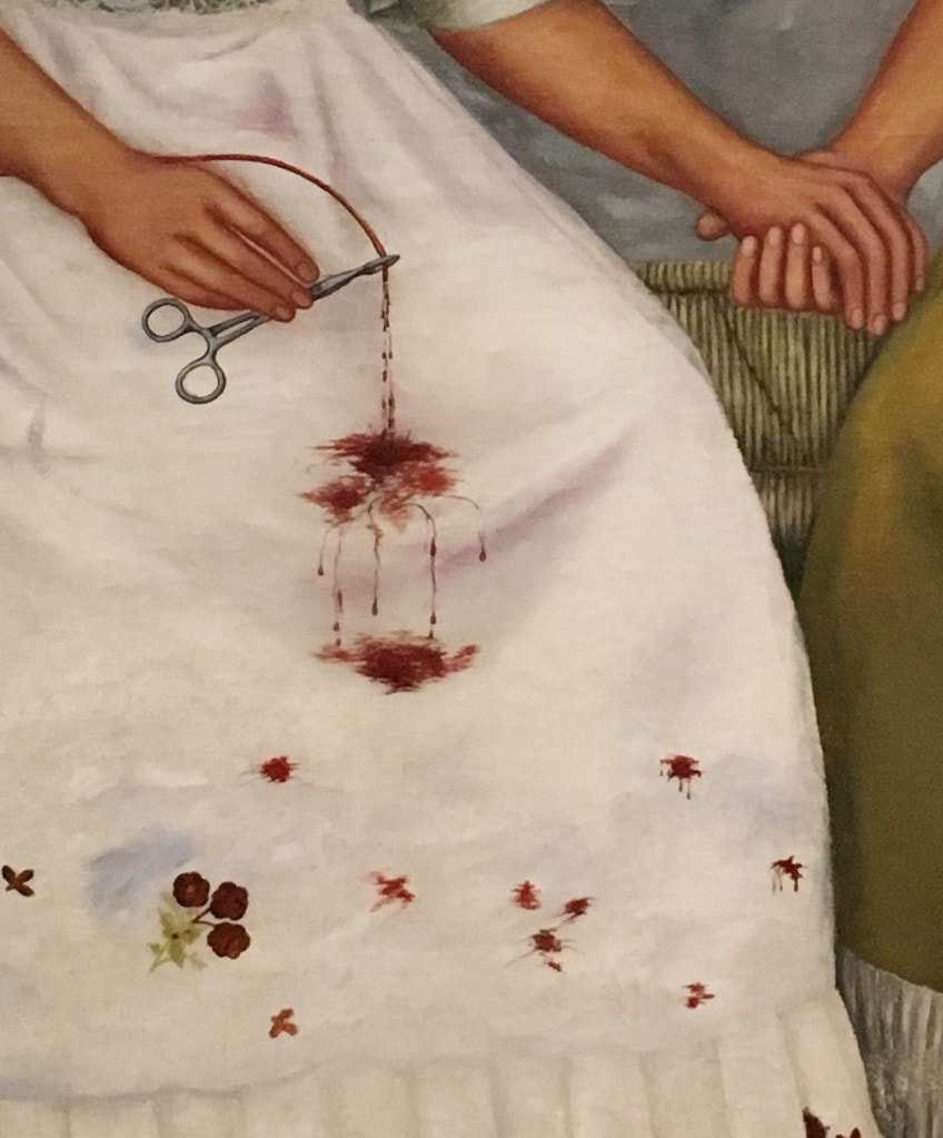 El detalle de la pintura de las dos Fridas