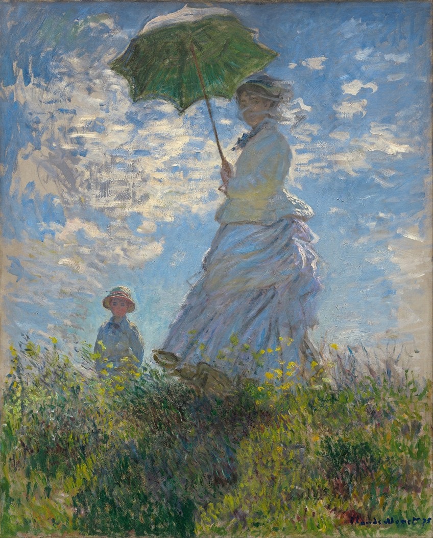 Mujer con una pintura de sombrilla