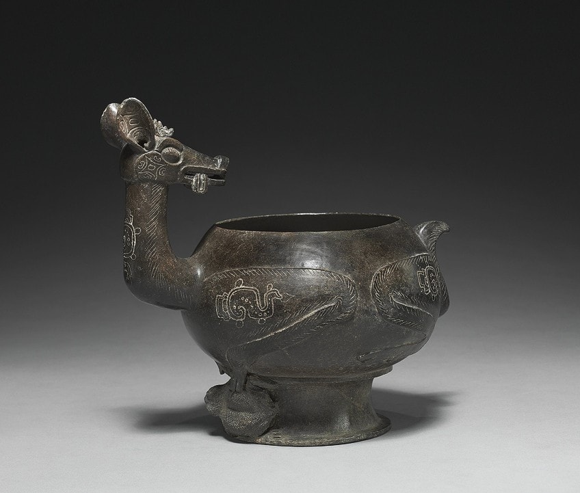 Imagen de arte maya de una vasija con forma de ciervo